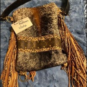 I have 4 real cowhide purses for sale! The first one is $450,rest are $160.